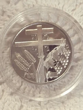 Божићни новчић у капсули